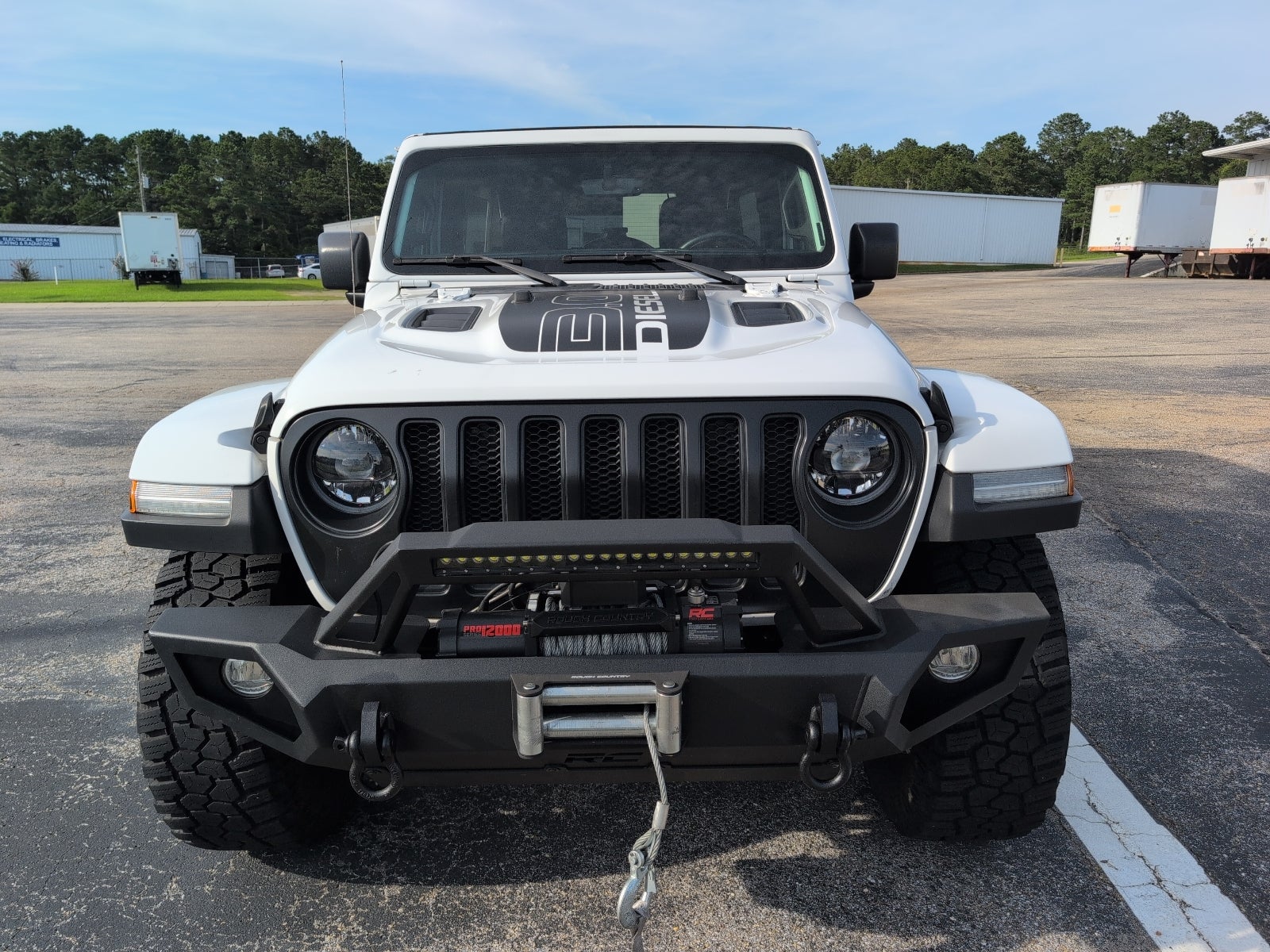 2023 Jeep Wrangler Rubicon Farout in White — front three-quarter view