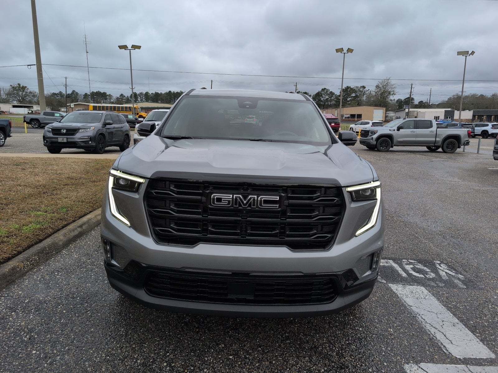 2026 GMC Acadia Elevation in Sterling Metallic — front three-quarter view