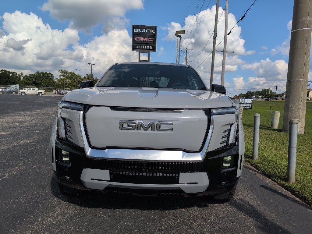 2025 GMC Sierra EV Extended Range Denali in Thunderstorm Gray — front three-quarter view