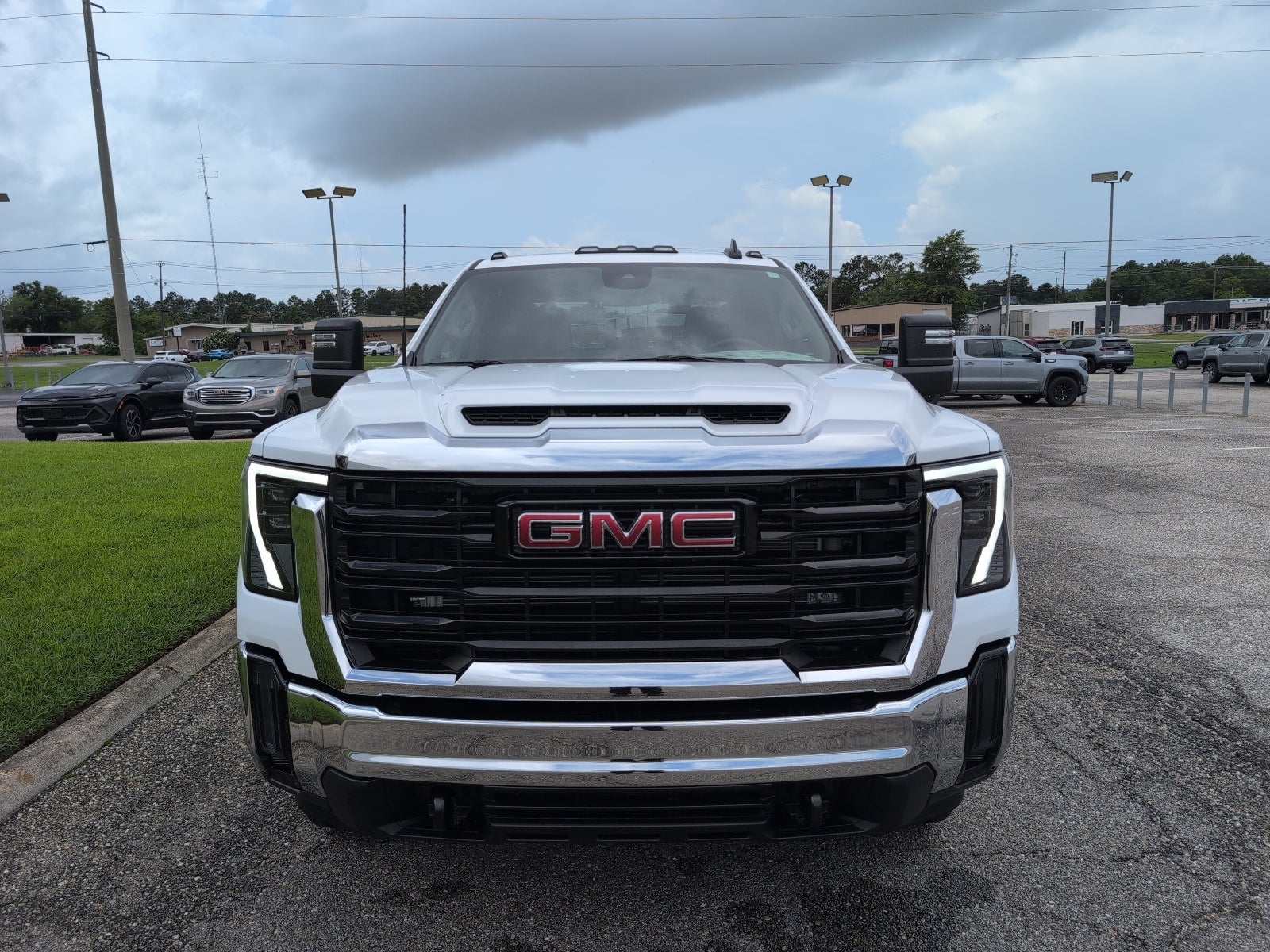 2026 GMC Sierra 2500 HD Pro in Summit White — front three-quarter view