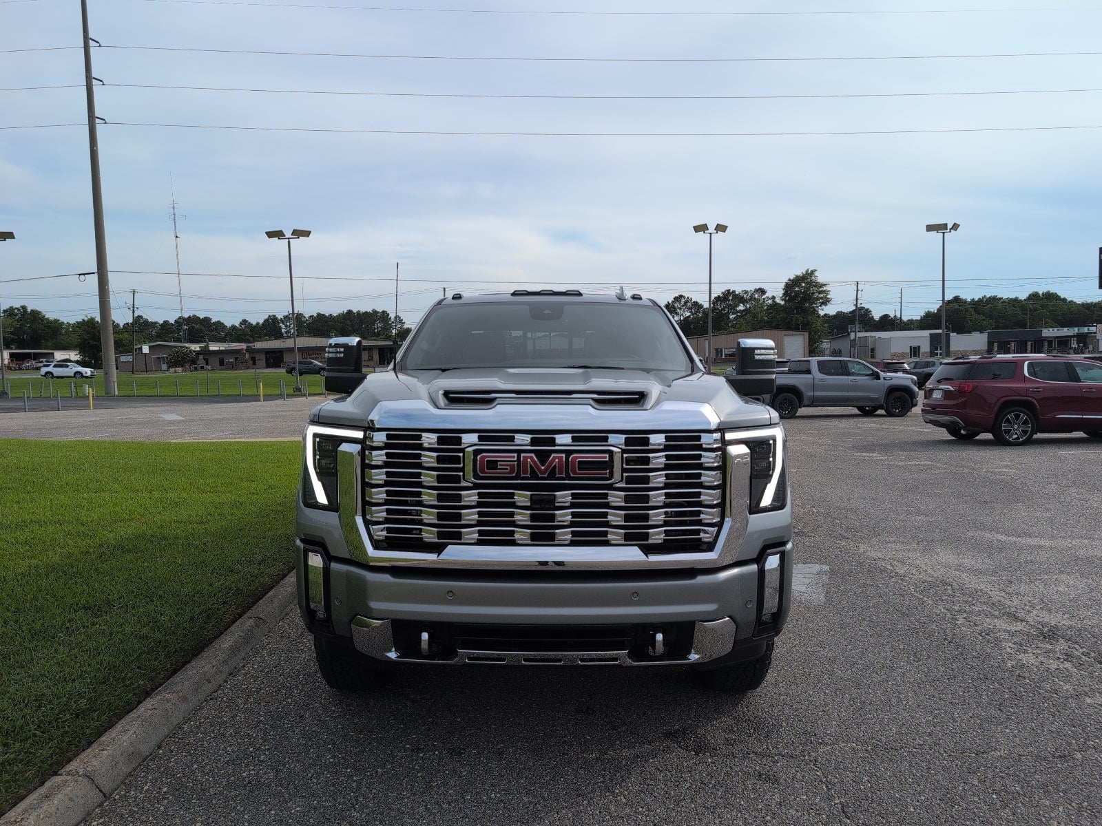 2026 GMC Sierra 2500 HD Denali in Sterling Metallic — front three-quarter view