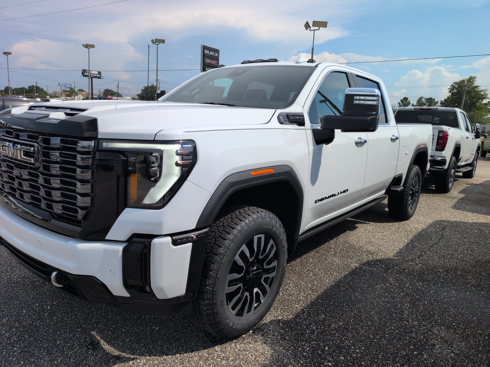 2026 GMC Sierra 2500 HD Denali Ultimate in Summit White — front three-quarter view