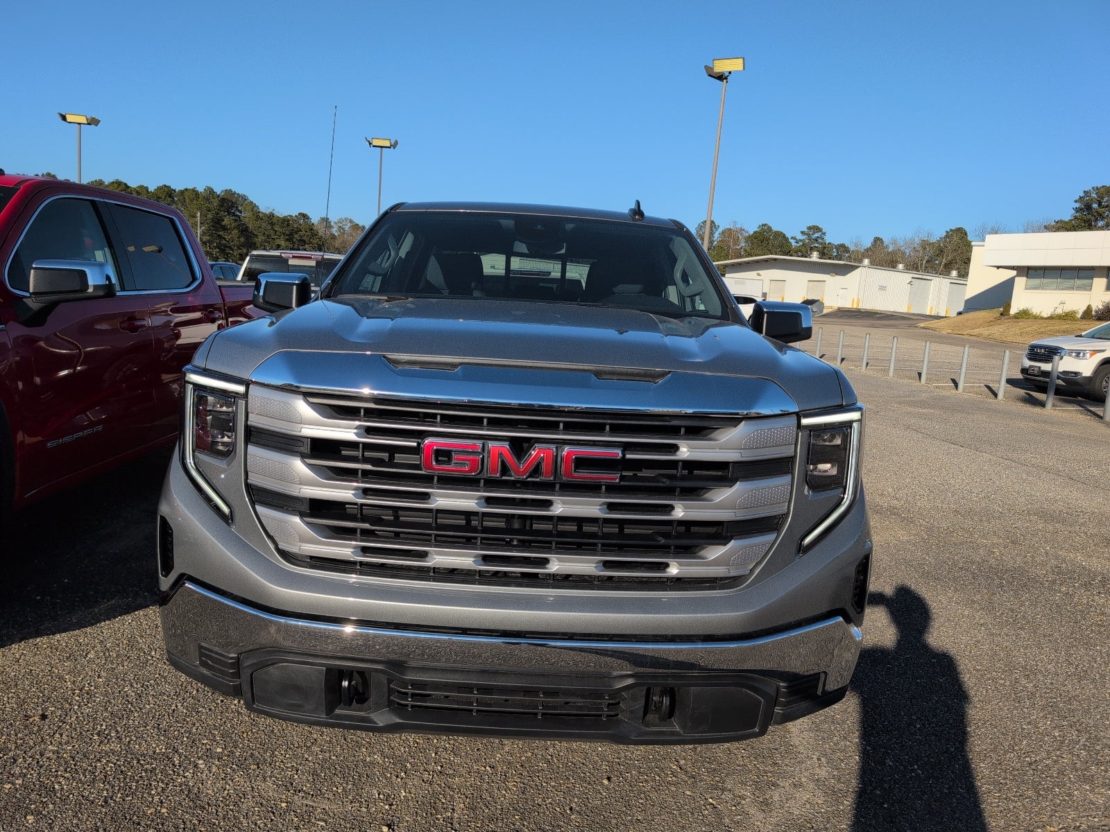 2025 GMC Sierra 1500 SLE in Sterling Metallic — front three-quarter view