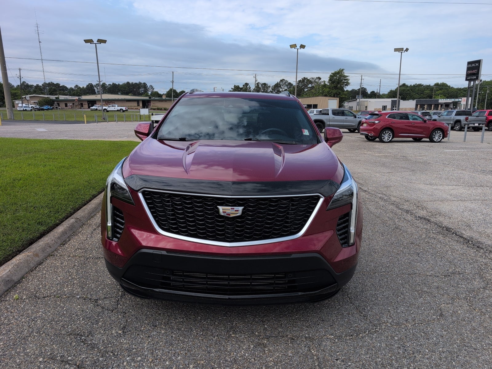 2019 Cadillac XT4 FWD Sport in Red Horizon Tintcoat — front three-quarter view