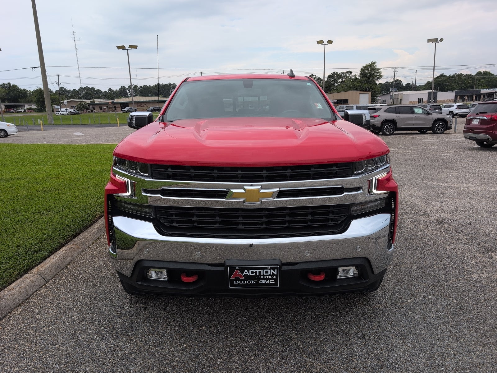 2021 Chevrolet Silverado 1500 LT in Red Hot — front three-quarter view
