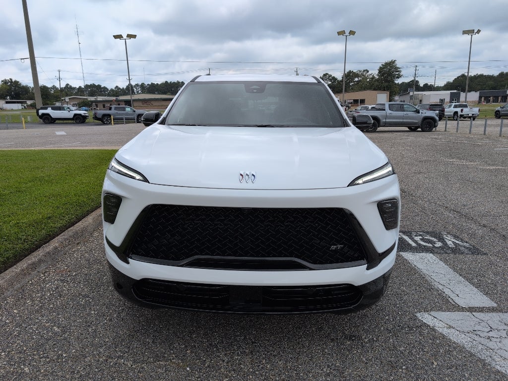 2026 Buick Enclave Sport Touring in Summit White — front three-quarter view