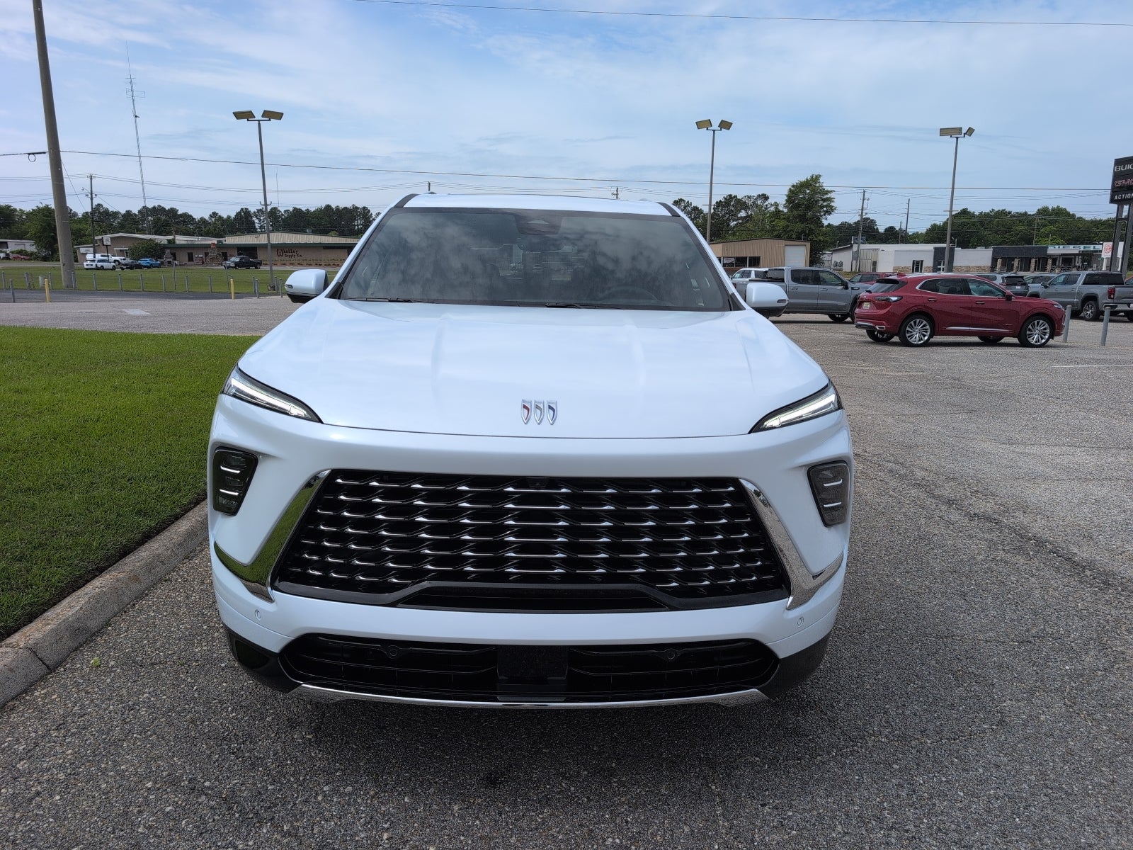 2026 Buick Enclave Avenir in Iridescent White Tricoat — front three-quarter view