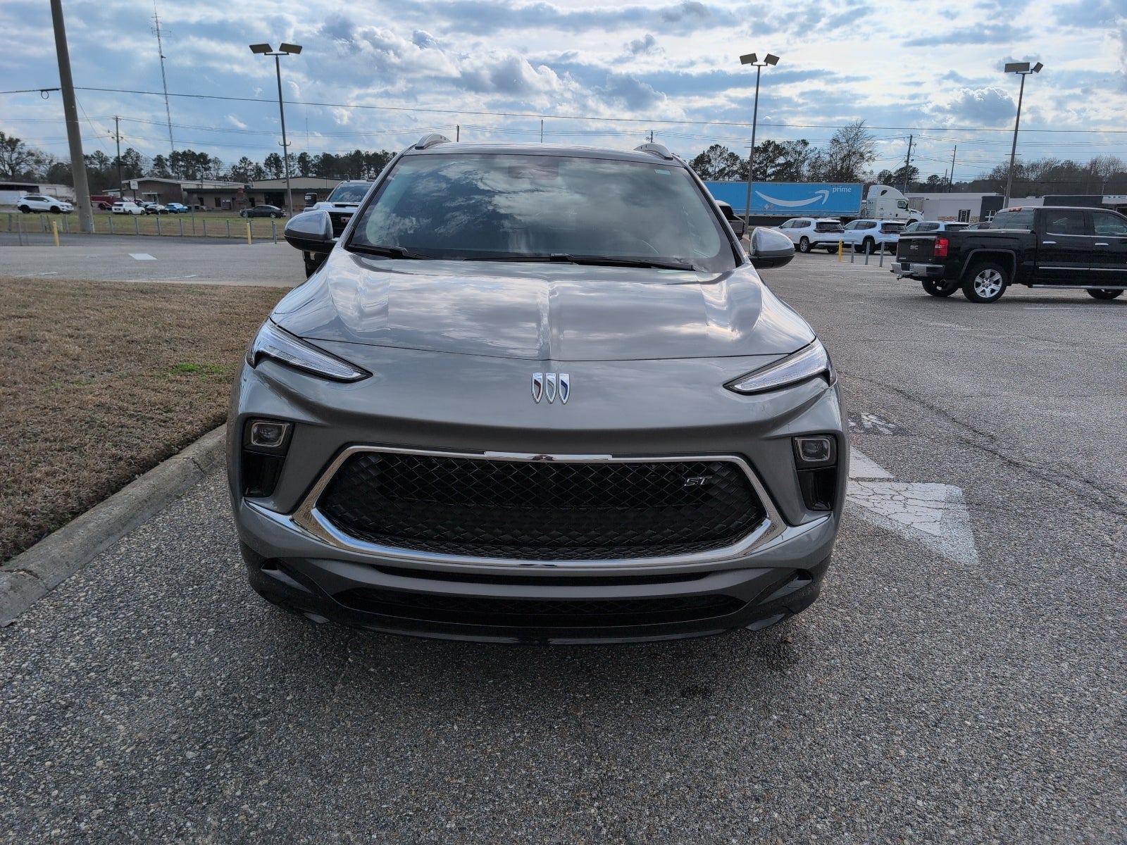2026 Buick Encore GX Sport Touring in Moonstone Gray Metallic — front three-quarter view