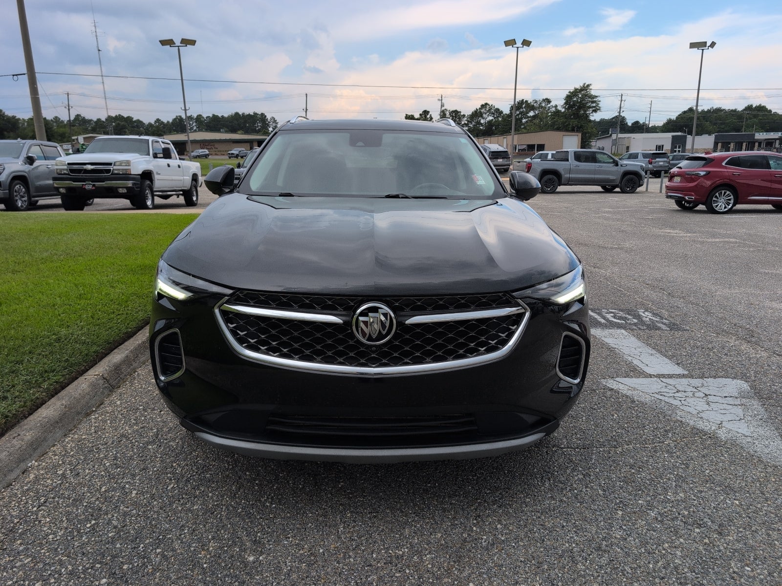 2023 Buick Envision Avenir in Ebony Twilight Metallic — front three-quarter view